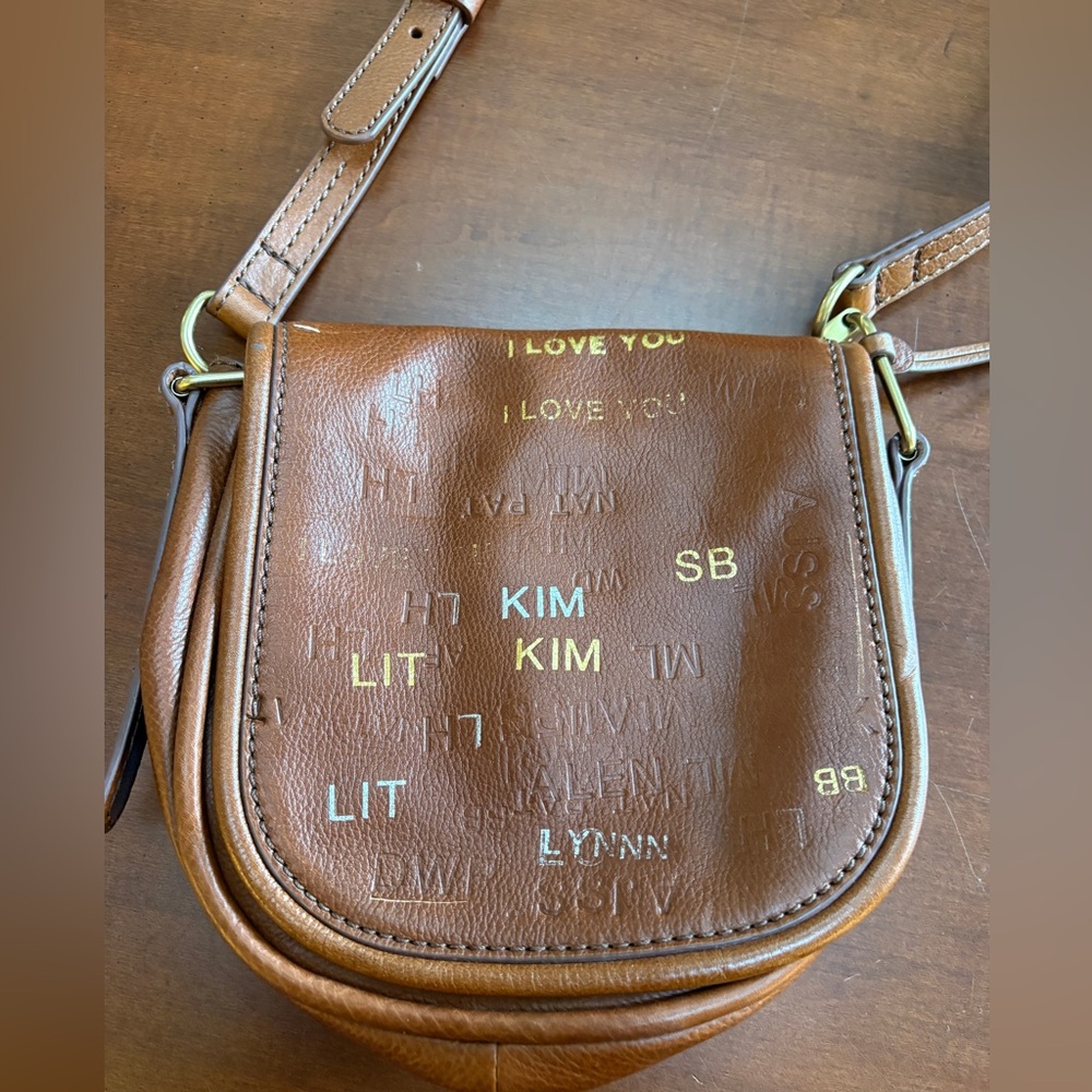 Fossil 1954 Vintage Tan Crossbody Bag with Embossed Text